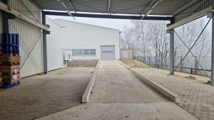 Errichtung einer Einhausung mit Verbindungsgang