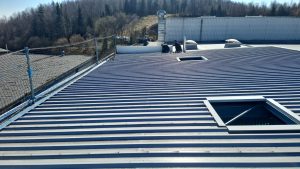 Errichtung einer Einhausung mit Verbindungsgang